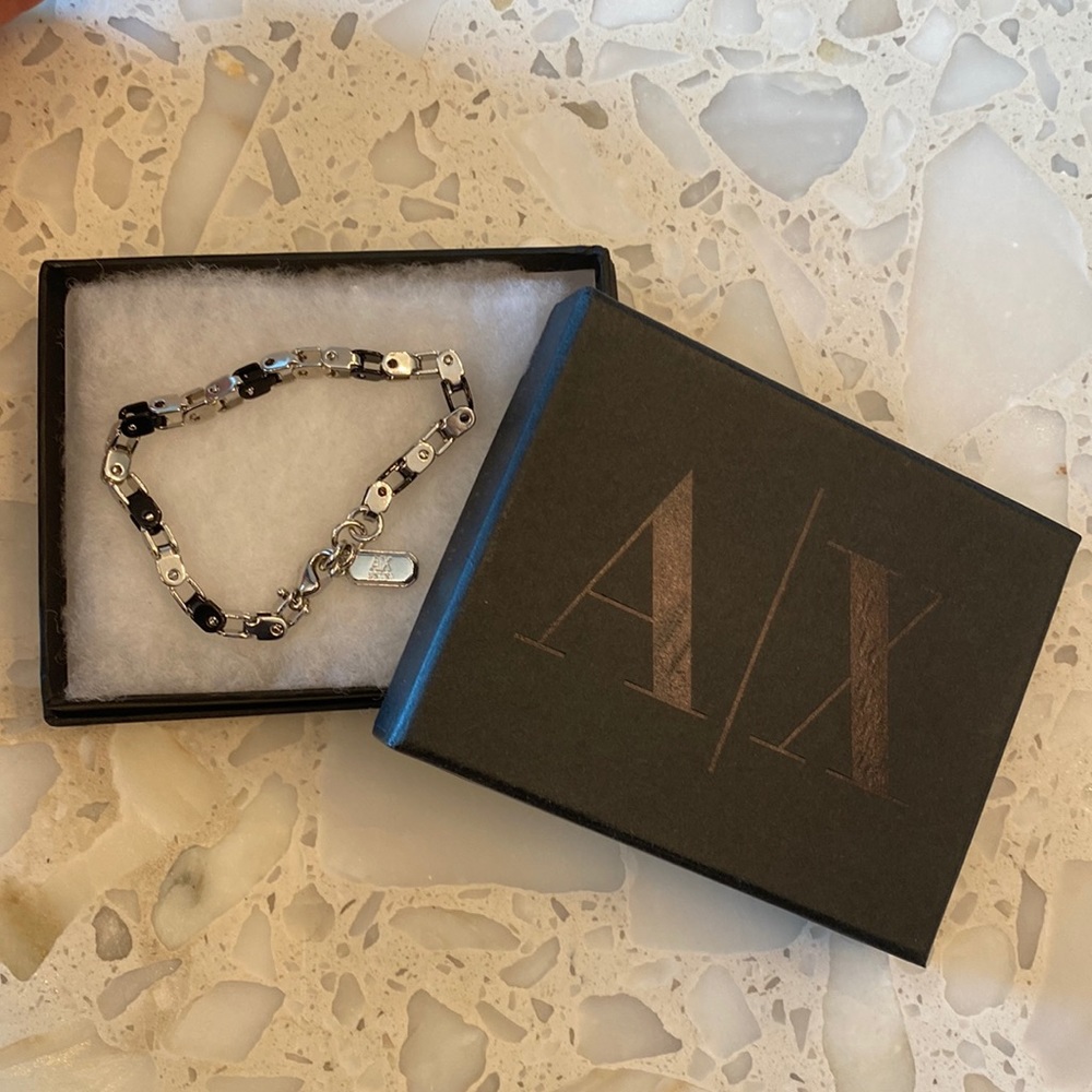 Men’s black and silver Armani Exchange bracelet.